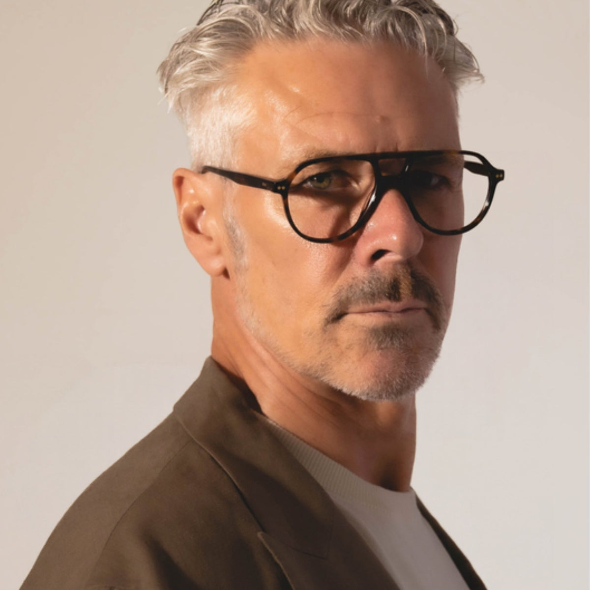 Man wearing Dr. J clear-lens glasses