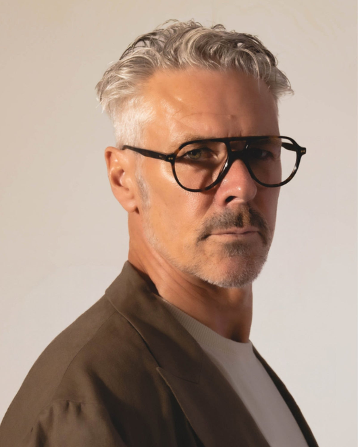 Man wearing Dr. J clear-lens glasses