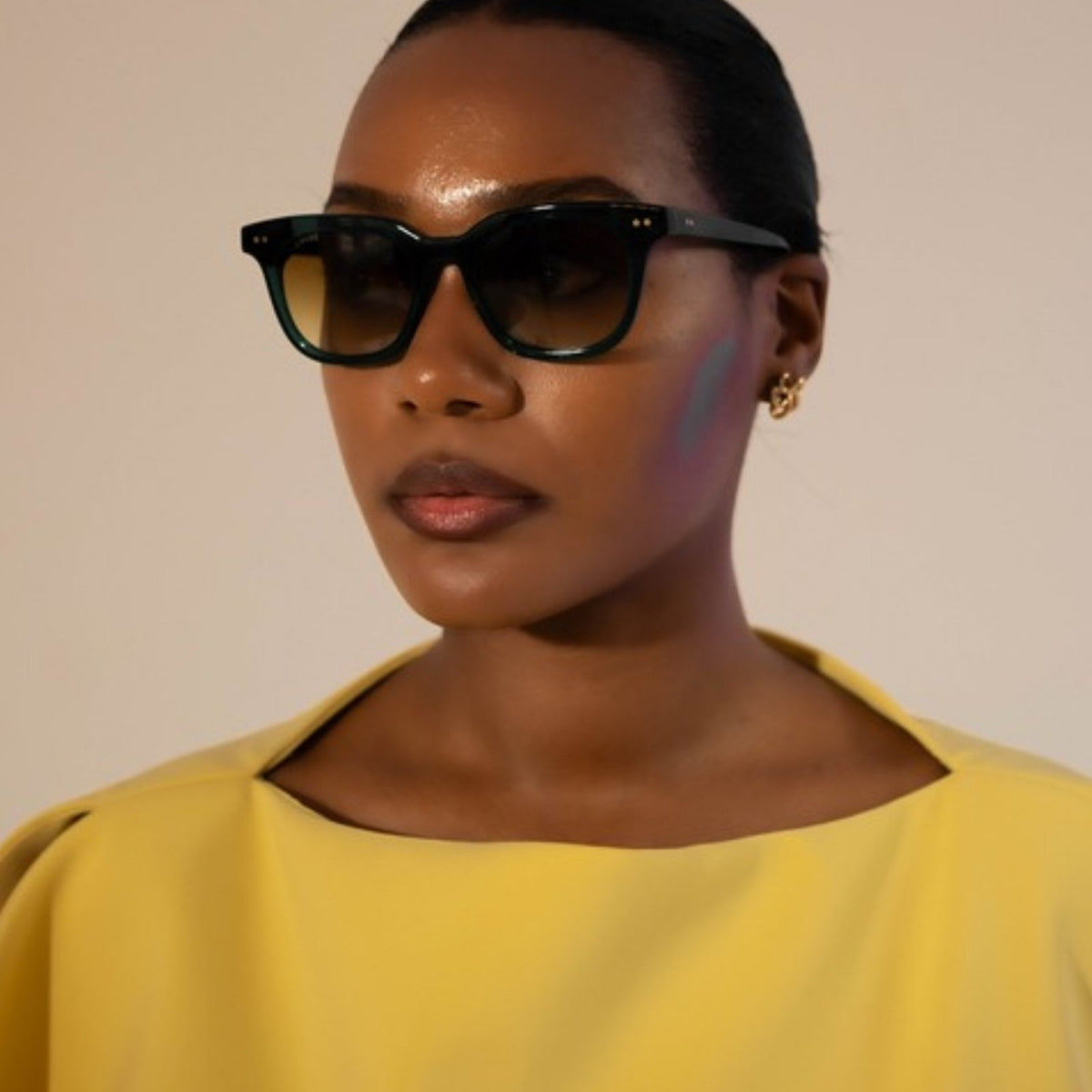 Woman wearing HYDE tinted glasses