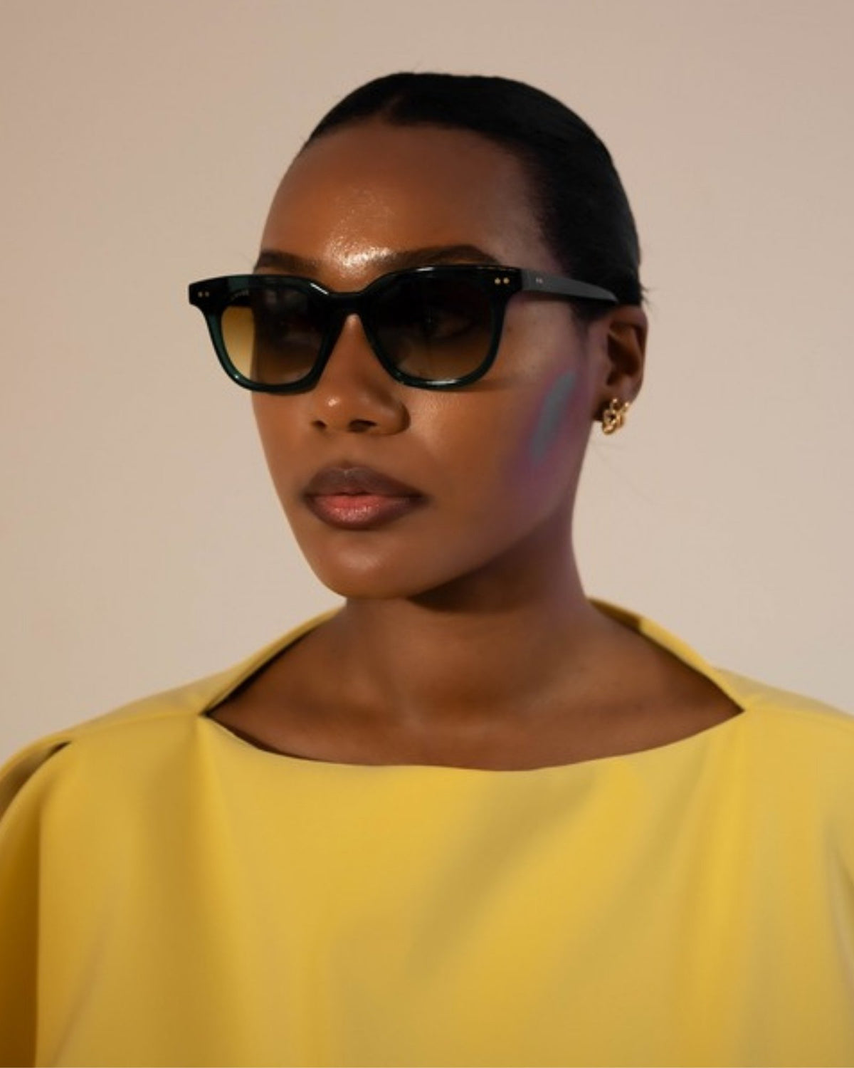 Woman wearing HYDE tinted glasses